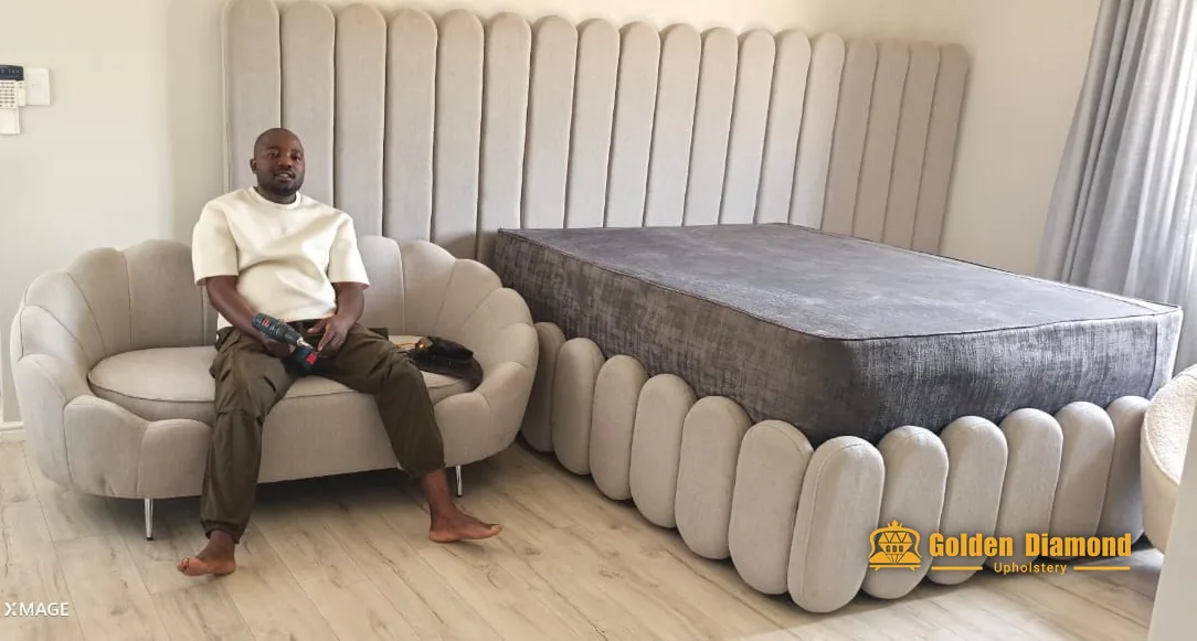 Cream sofa and matching bed base — sofas & seating upholstery project by Golden Diamond Upholstery, Cape Town