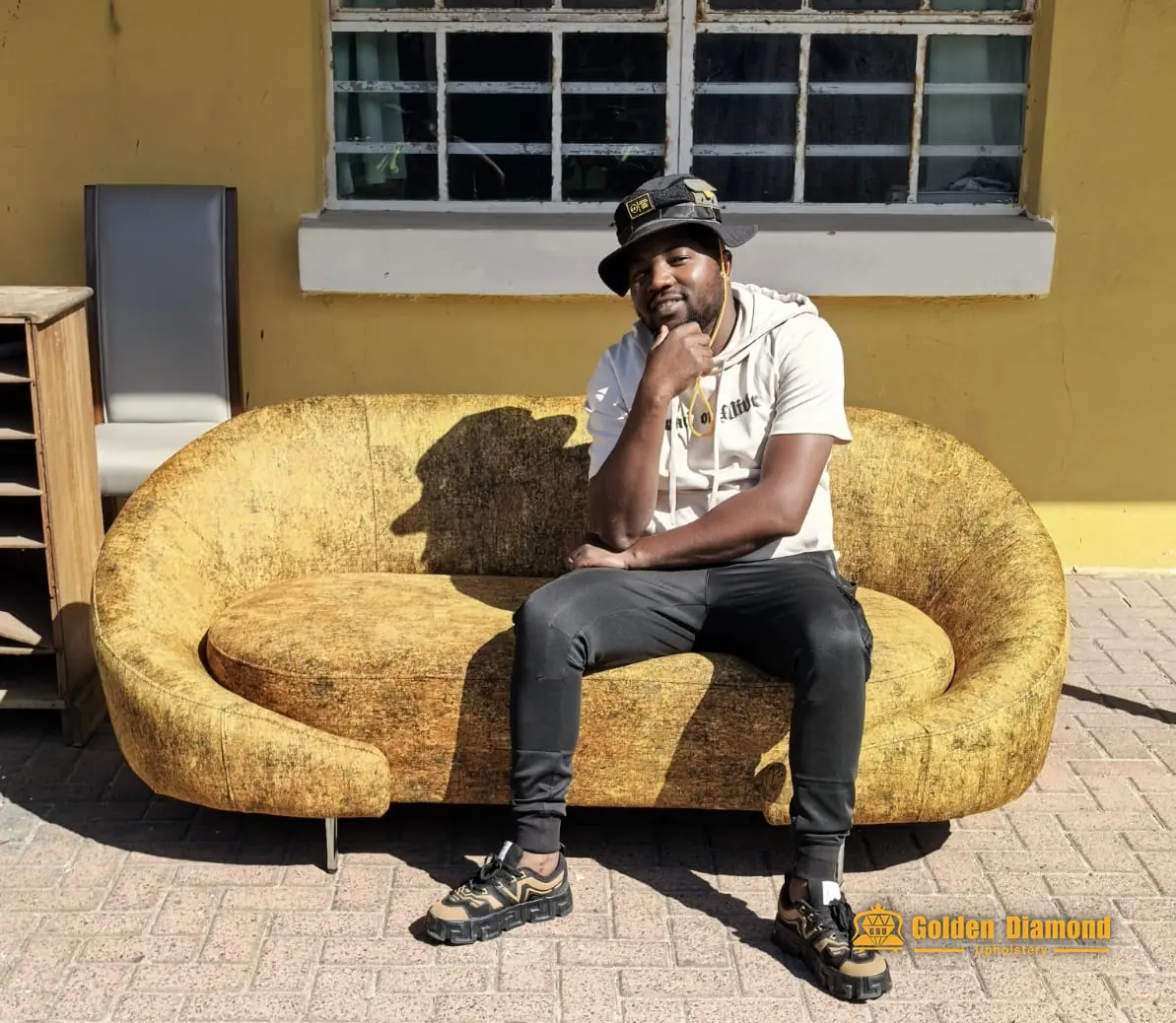Gold crushed-velvet curved sofa custom made by Golden Diamond Upholstery, Cape Town